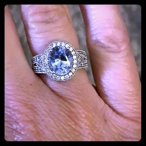 Diamond and blue topaz ring